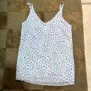 Colorful Cabi Tunic tank with keyhole front and v-style back. Adjustable straps